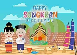 Happy Songkran festival - Thai boy and Thai girl respect hands and in Sand pagodas At the temple Chiangmai Thailand design