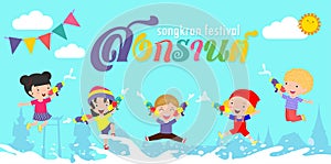 Happy Songkran Festival Thai New Year, kids enjoy splashing water in Songkran