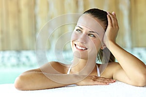 Happy in spa looking at side