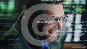 Happy specialist creating code at data hologram closeup. Smiling man programming