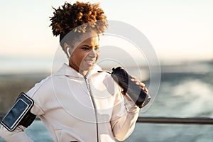 Happy Sporty Black Woman In Activewear Relaxing After Fitness Training Outdoors