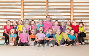 Happy sporty children in gym photo