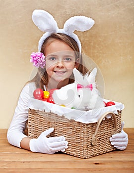 Happy spring girl with easter basket