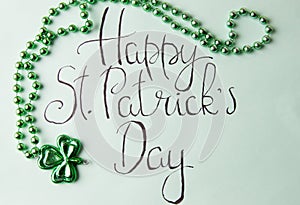 Happy St Patrick day card and green accessories photo