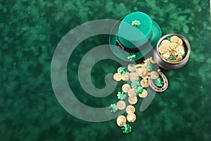 Happy St. Patrick's Day background with a leprechaun green hat full of gold coins