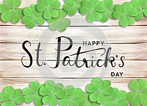 Happy St. Patrick`s Day Black Text Typography Background with Green Shamrocks on Wooden Texture