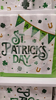 Happy St. Patrick& x27;s Day party napkins with shamrocks and horseshoes