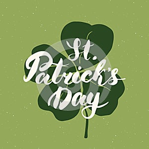 Happy St Patrick`s Day Vintage greeting card Hand lettering on clover silhouette, Irish holiday grunge textured retro design