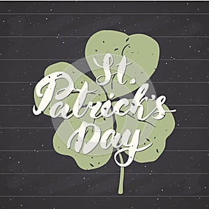 Happy St Patrick`s Day Vintage greeting card Hand lettering on clover silhouette, Irish holiday grunge textured retro design vecto