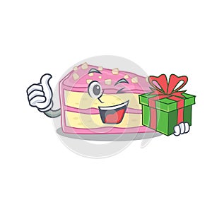 Happy strawberry slice cake character having a gift box