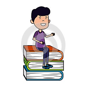 happy student boy seated in pile books