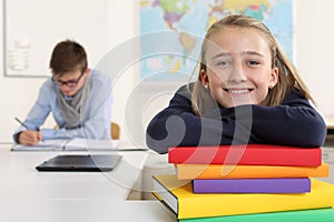 Happy student in her classroom