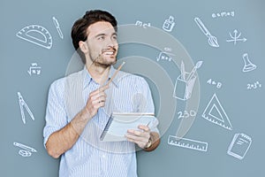 Happy student looking glad while being at the Math lesson