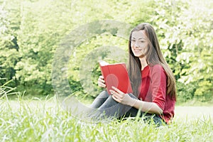 Happy student outdoors relaxed