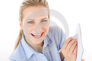 Happy student woman write notes