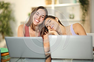 Happy students posing together at home