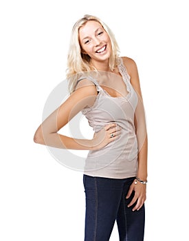Happy, stylish and portrait of a woman on a white background with hands on hip for confidence. Smile, young and a girl