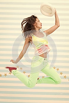 Happy and stylish sexy woman. Glamour fashion model. Crazy girl in colorful sporty clothes. Fashion and beauty. Hipster
