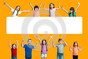 Happy success teensl celebrating being a winner. Dynamic energetic image of happy children