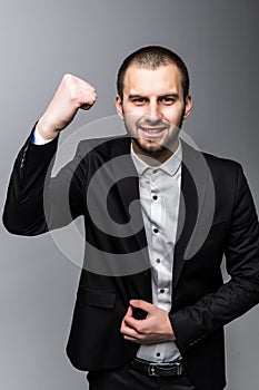 Happy successful business man isolated on white background.