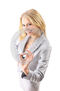 Happy successful business woman making ok sign