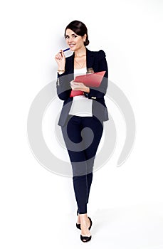 Happy successful business woman with red folder on white background