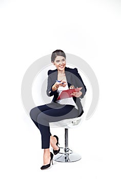 Happy successful business woman with red folder on white background