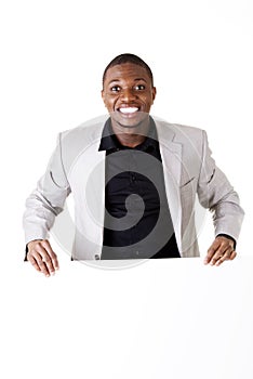 Businessman showing blank advertisement