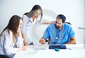 Happy Successful Medical Team work together in hospital