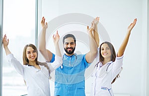 Happy Successful Medical Team work together in hospital