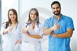 Happy Successful Medical Team work together in hospital