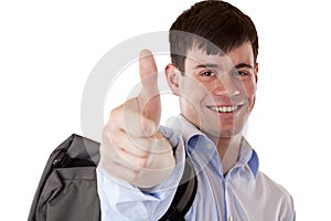 Happy successful student shows thumb up