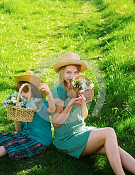 Happy summer family at park. Mother and child at spring picnic. Outdoor leisure.