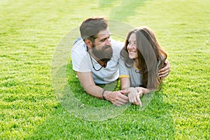 Happy summer. Happy family relax on green grass. Couple in love dating on natural landscape. Happy vacation. Family