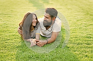 Happy summer. Happy family relax on green grass. Couple in love dating on natural landscape. Happy vacation. Family