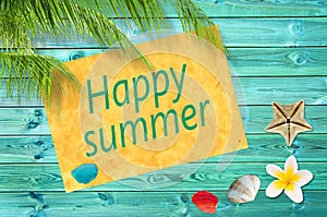 Happy summer written on a paper on colorful wood background with palm trees