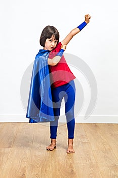 Happy superhero having fun for girl power and feminism concept