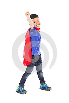 Happy superhero kid imitate flying pose