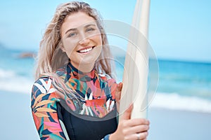 Happy, surfer and woman sport athlete at the beach water waves with a surfboard. Portrait of a sports person from