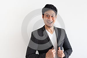 Happy and surprise face of business man in concept of business success.