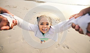 Happy, swinging and portrait of child at the beach for travel, support and fun. Spinning, smile and summer with girl and
