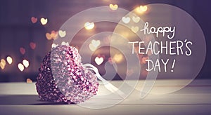 Happy Teacher`s day message with a pink heart