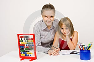 Happy teacher and student in school