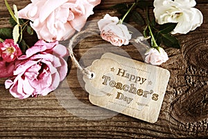 Happy Teachers Day message card with small roses