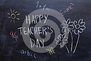 Happy Teachers Day written in chalkboard