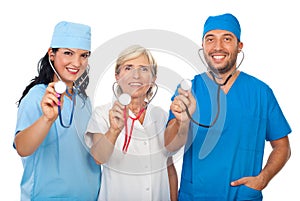 Happy team of doctors with stethoscopes