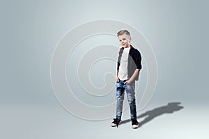 Happy teen boy studio portrait on white background