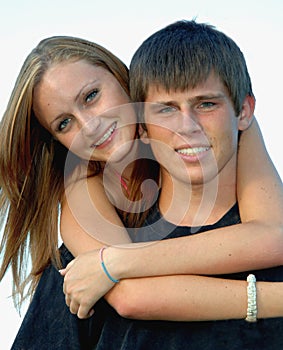 Happy teen couple faces