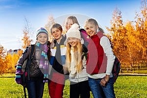 Happy teen friends outside