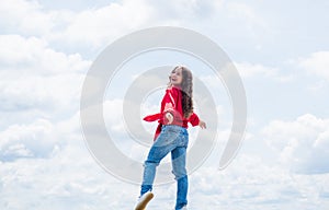 Happy teen girl enjoy good spring weather, childhood happiness